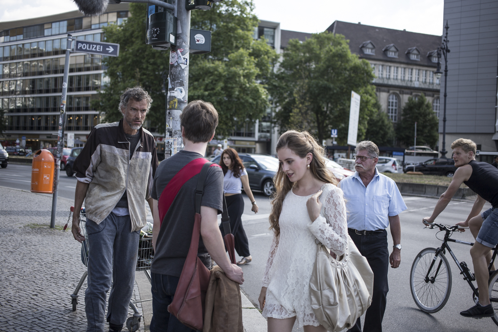 Unknown people cross each other when passing by the street.